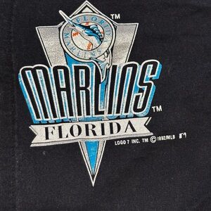 Vintage Florida Marlins Black jersey Tee with original team Graphic Design